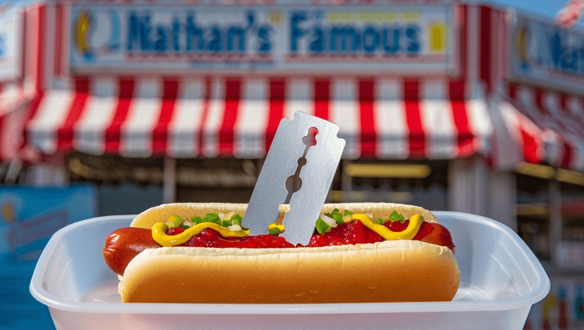 
    “I’m still in shock”: Tourists say they found a razor blade in a Nathan’s Famous hot dog  