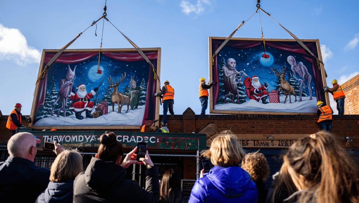 “Lovecraftian”: Huge AI-generated Christmas mural removed after going viral for all the wrong, deeply cursed reasons